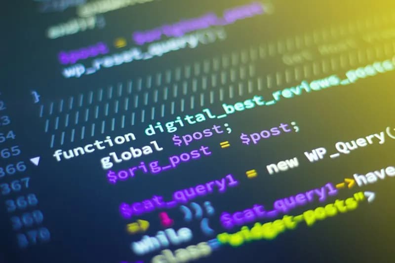 Close-up of colorful syntax-highlighted code in a dark editor on a computer screen